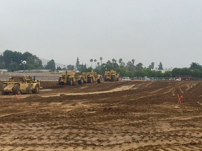 graders leaving construction site